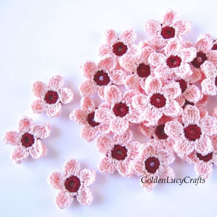 Crochet cherry blossom flowers.