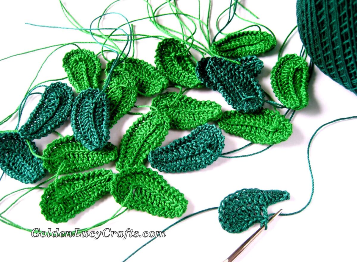 Crocheted green leaves with not weaved in ends.