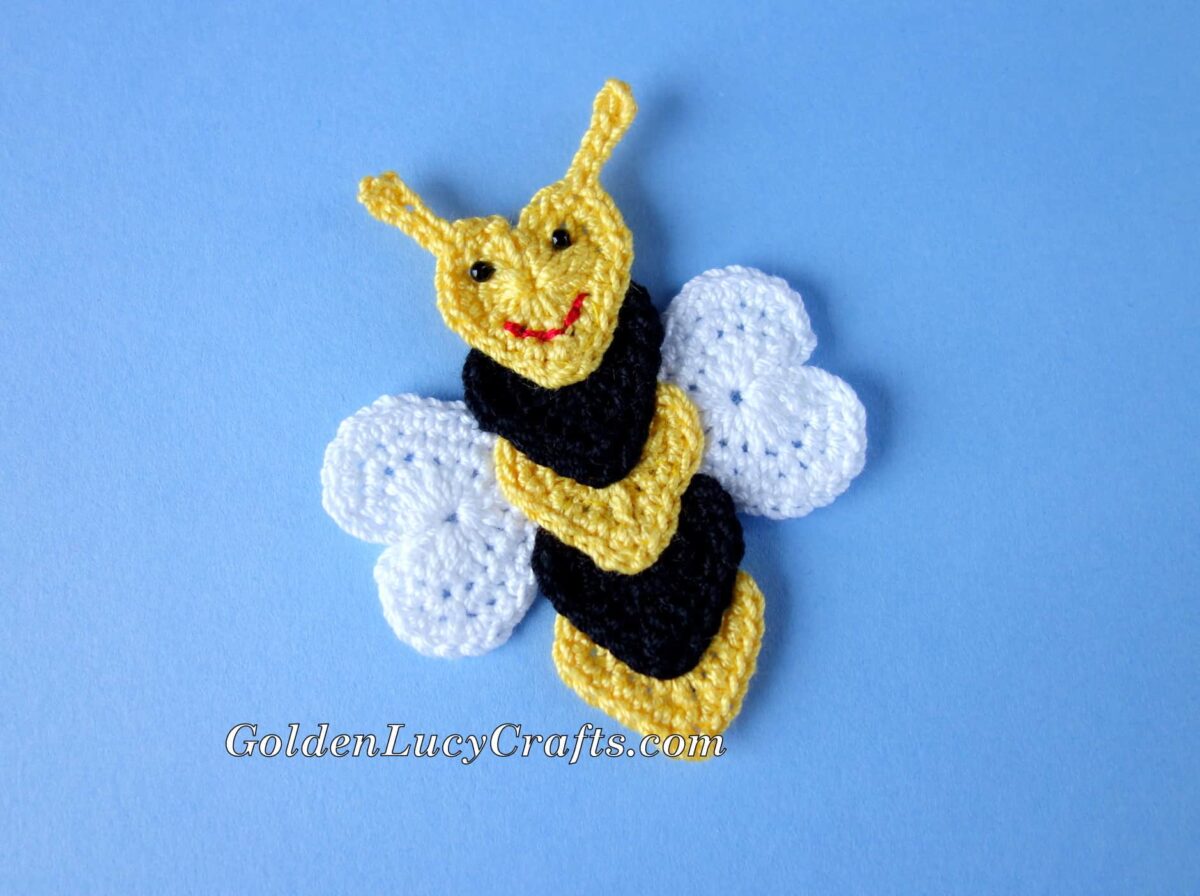 Crochet Bee applique made from hearts.