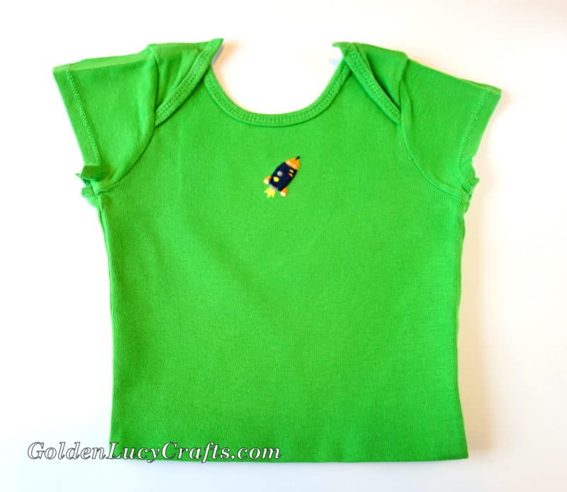 Front part of green baby t-short.
