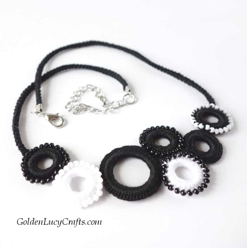 Black and white beaded rings crochet necklace.