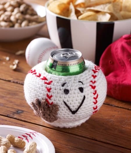 Crochet baseball cozy for soda can.