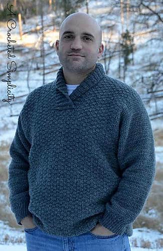 Man wearing crocheted pullover.