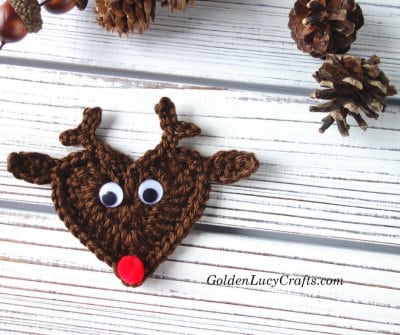 Crochet heart-shaped reindeer applique.