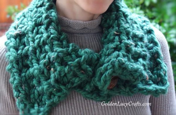 Crocheted green cowl.