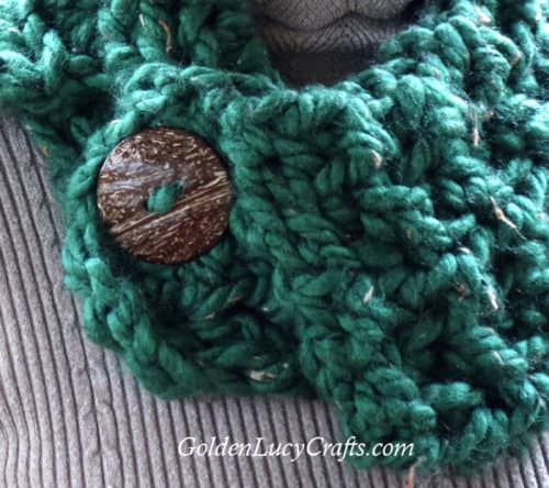 Crochet cowl, button, close up image