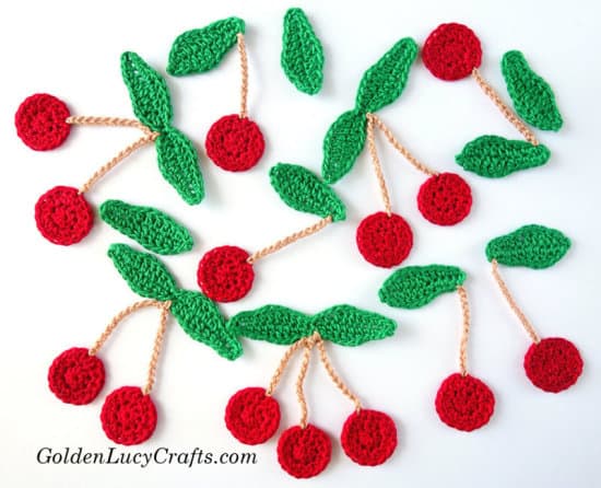Crochet cherry appliques.