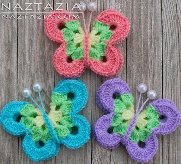 Three crocheted butterflies.