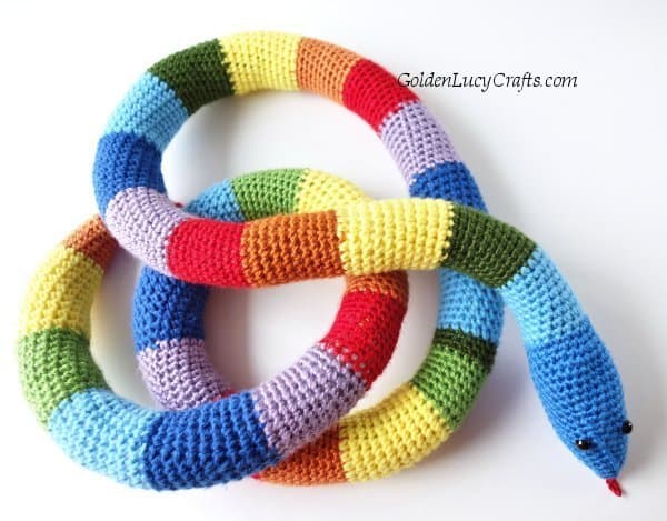 Crocheted rainbow snake.