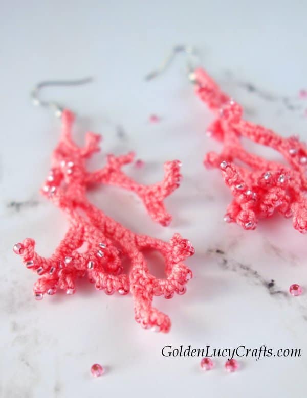 Crochet coral earrings embellished with beads