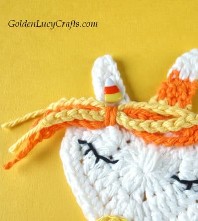 Crochet Halloween unicorn applique close up picture.
