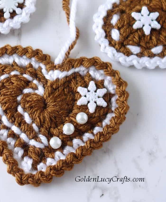 Crochet gingerbread heart close up picture.