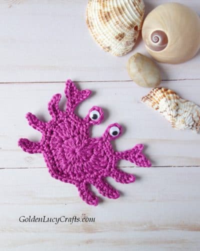 Crochet purple crab applique.