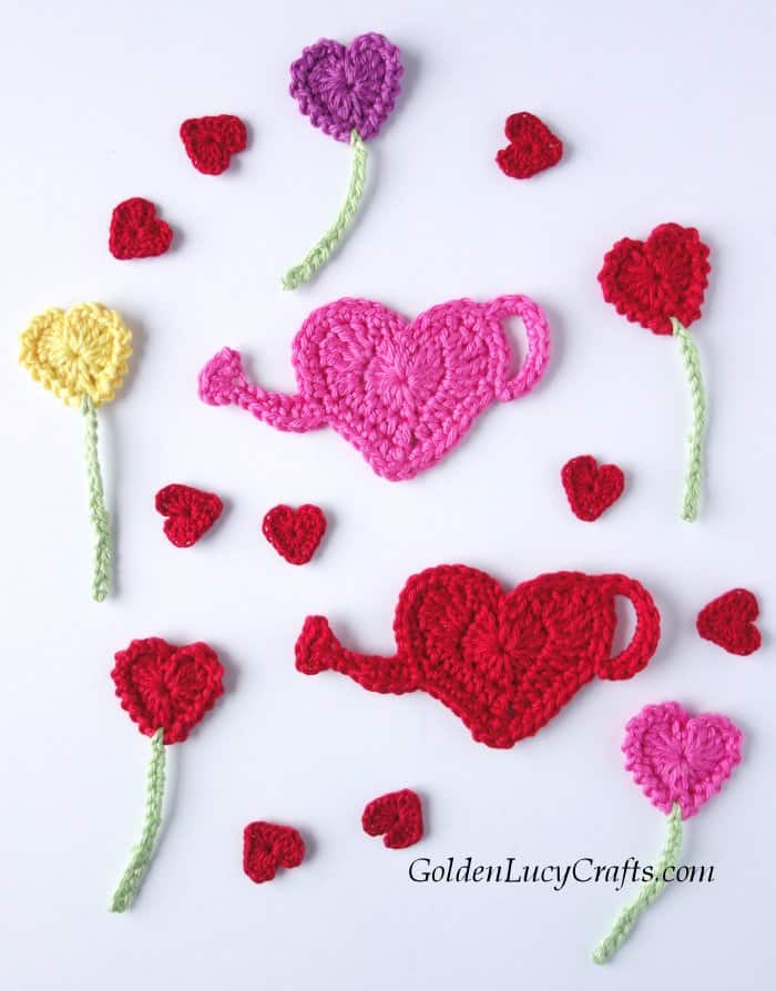 Crochet appliques heart flowers, watering cans, small hearts.