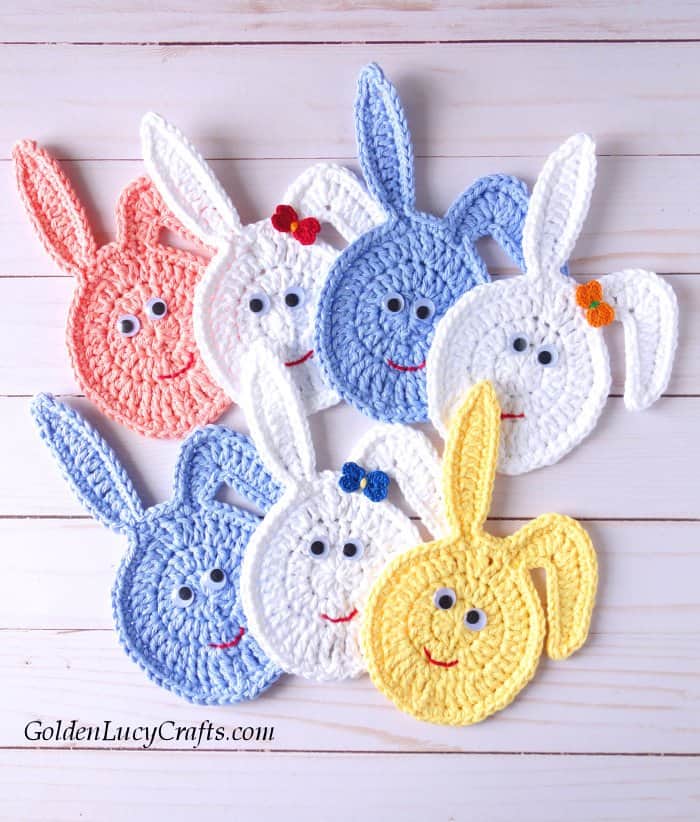 Seven crocheted bunnies.