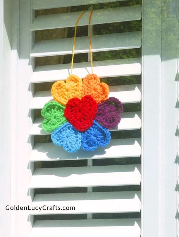 Crochet rainbow flower window decor.