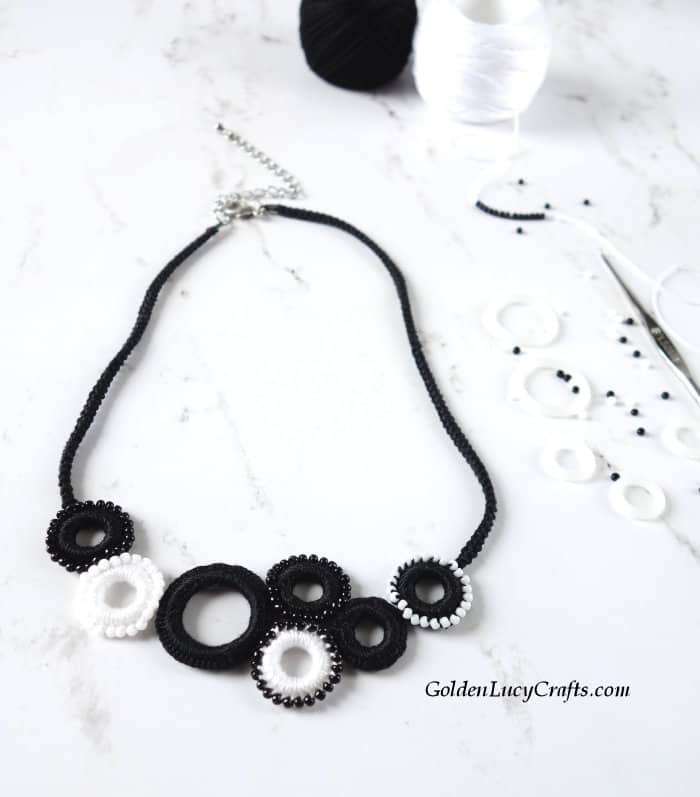 Crocheted blck and white necklace.