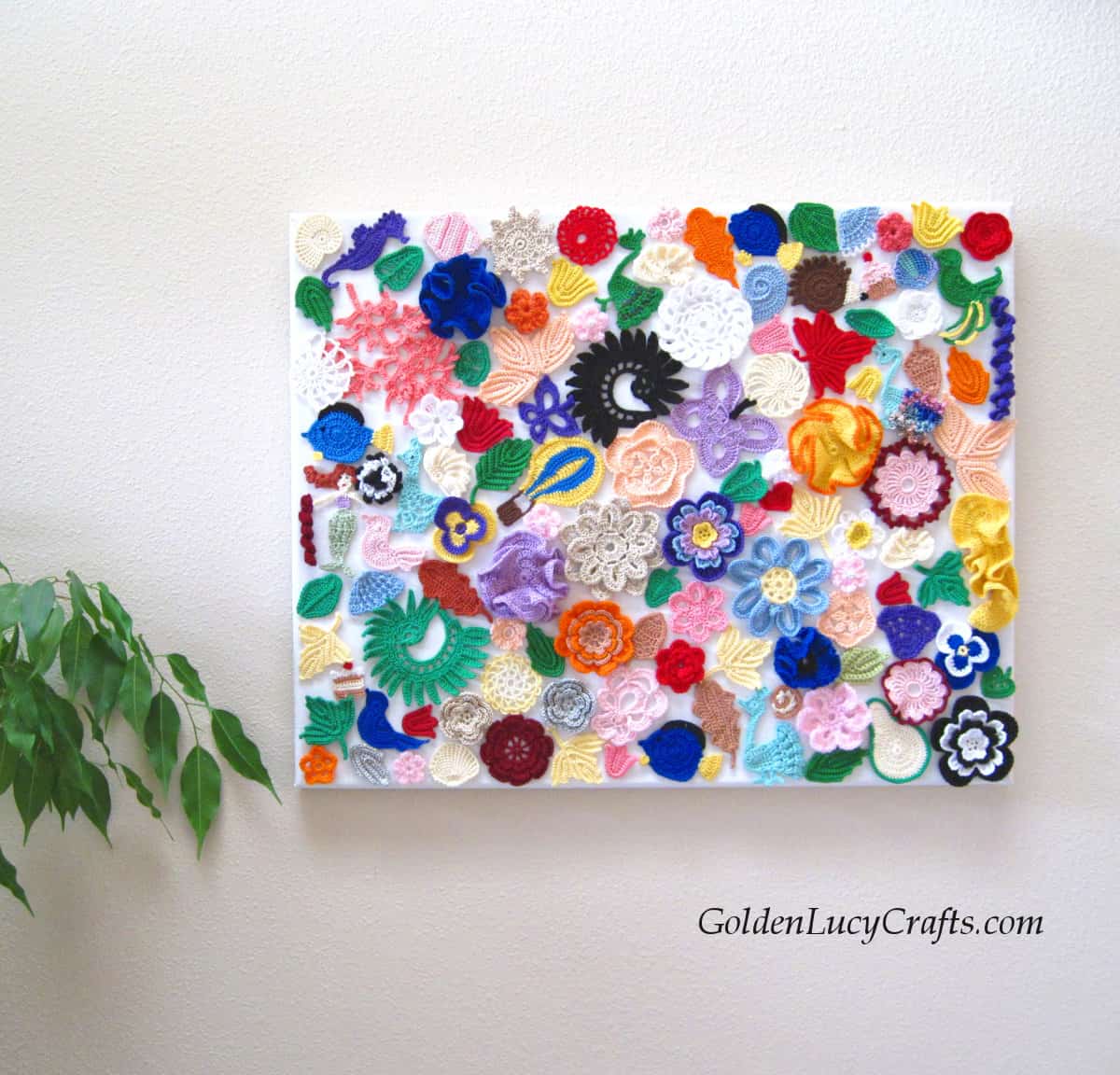 Crochet wall art made from different crocheted  applique samples.