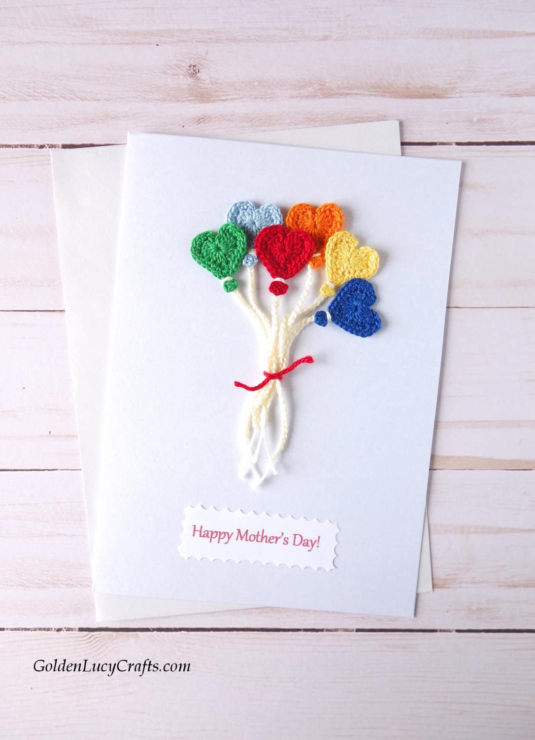 Mother's Day handmade card with crocheted heart-shaped balloons.