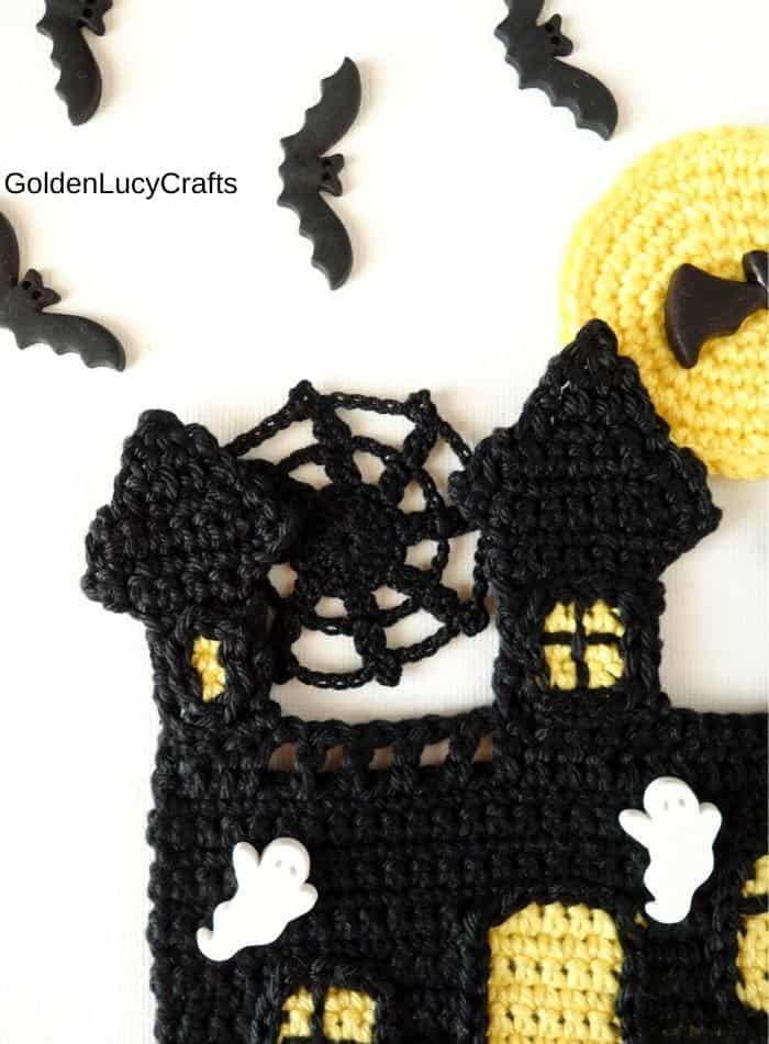 Crochet Haunted House close up image of the spider web.