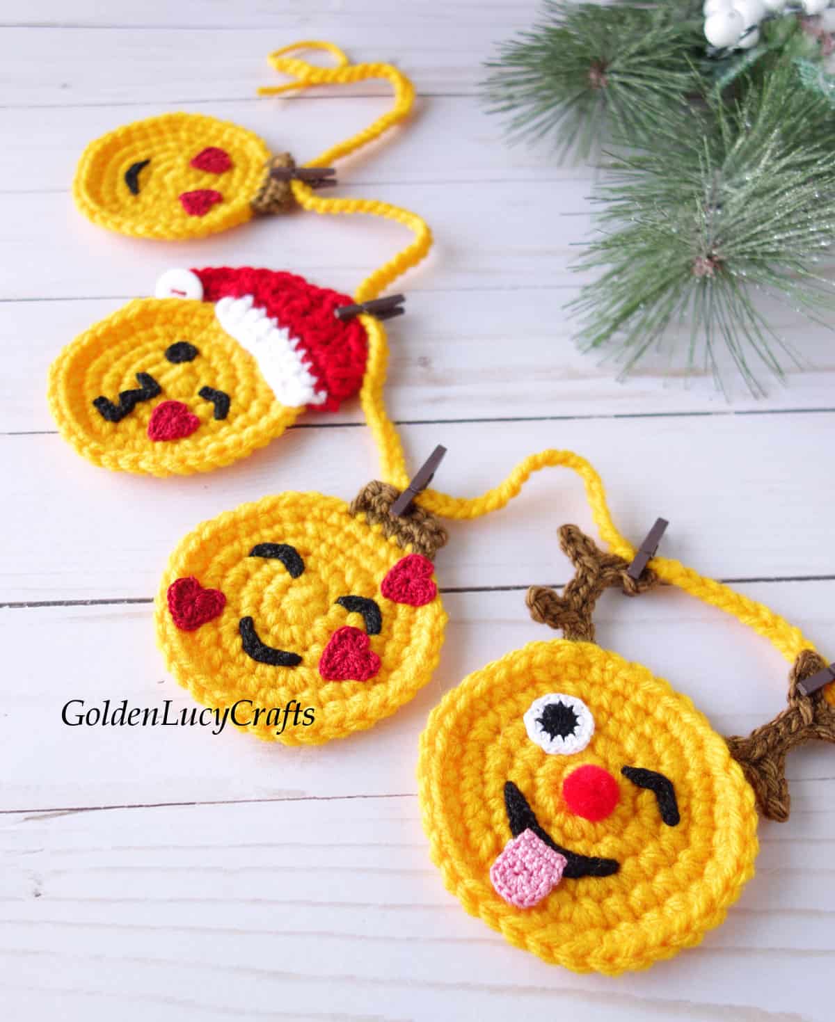 Crochet Christmas emoji garland close up image.