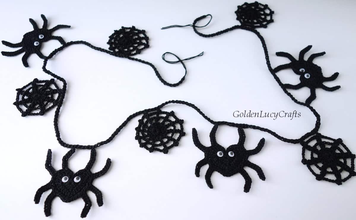 Crochet spiders and spider webs garland.