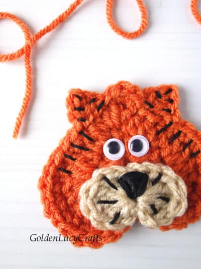 Crocheted Tiger applique close up image.