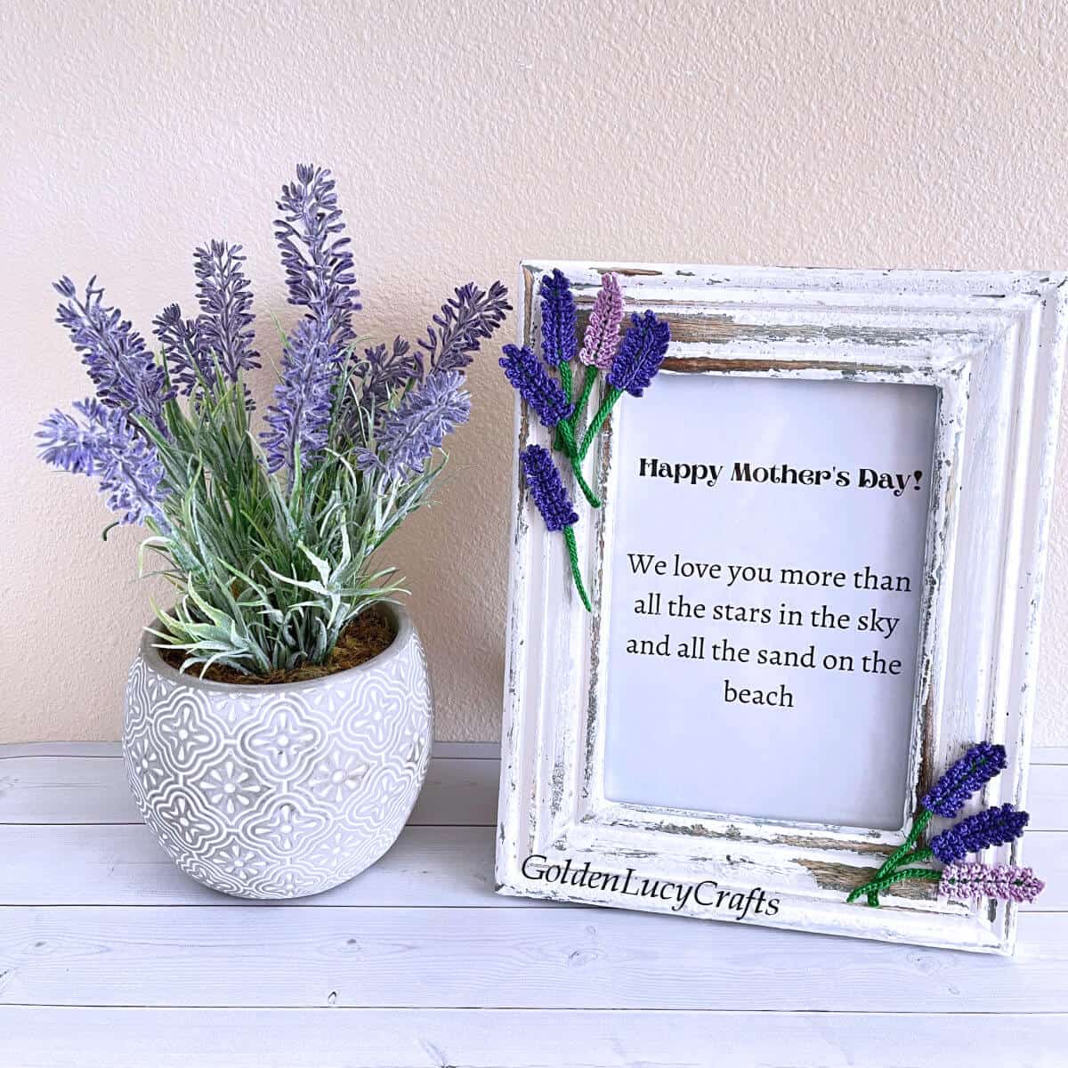 Mother's Day picture frame embellished with crochet lavender flowers, lavender in a pot next to it.
