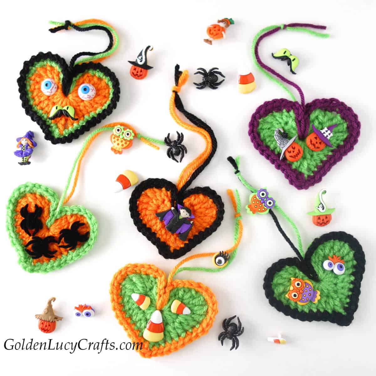 Crocheted Halloween heart ornaments embellished with Halloween themed buttons.
