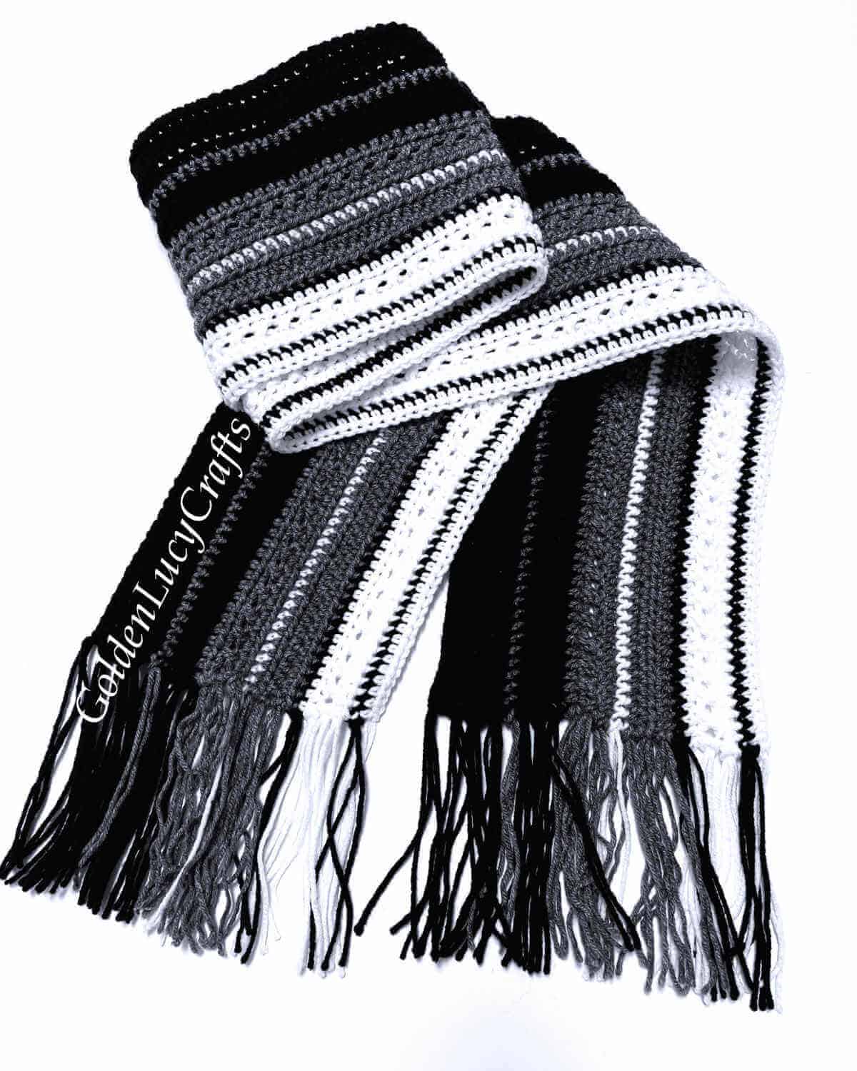 Crochet men's scarf in white, grey and black colors.