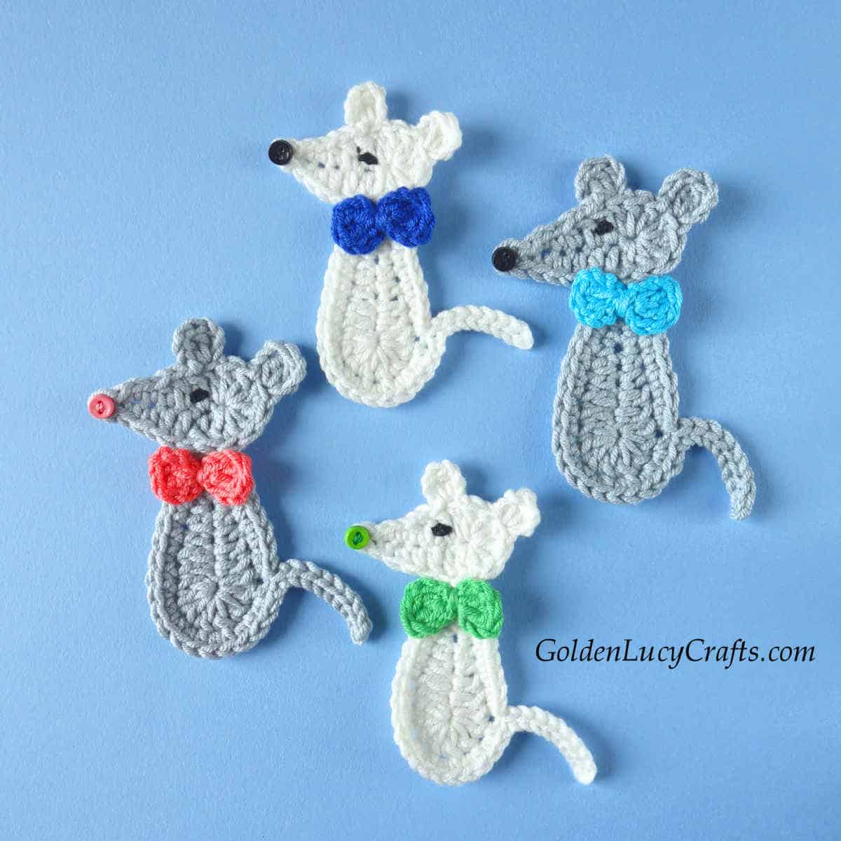 Four crocheted mouse appliques.