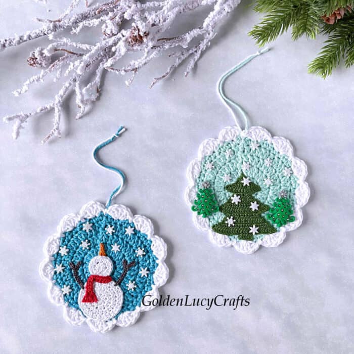 Two crochet winter themed round ornaments.