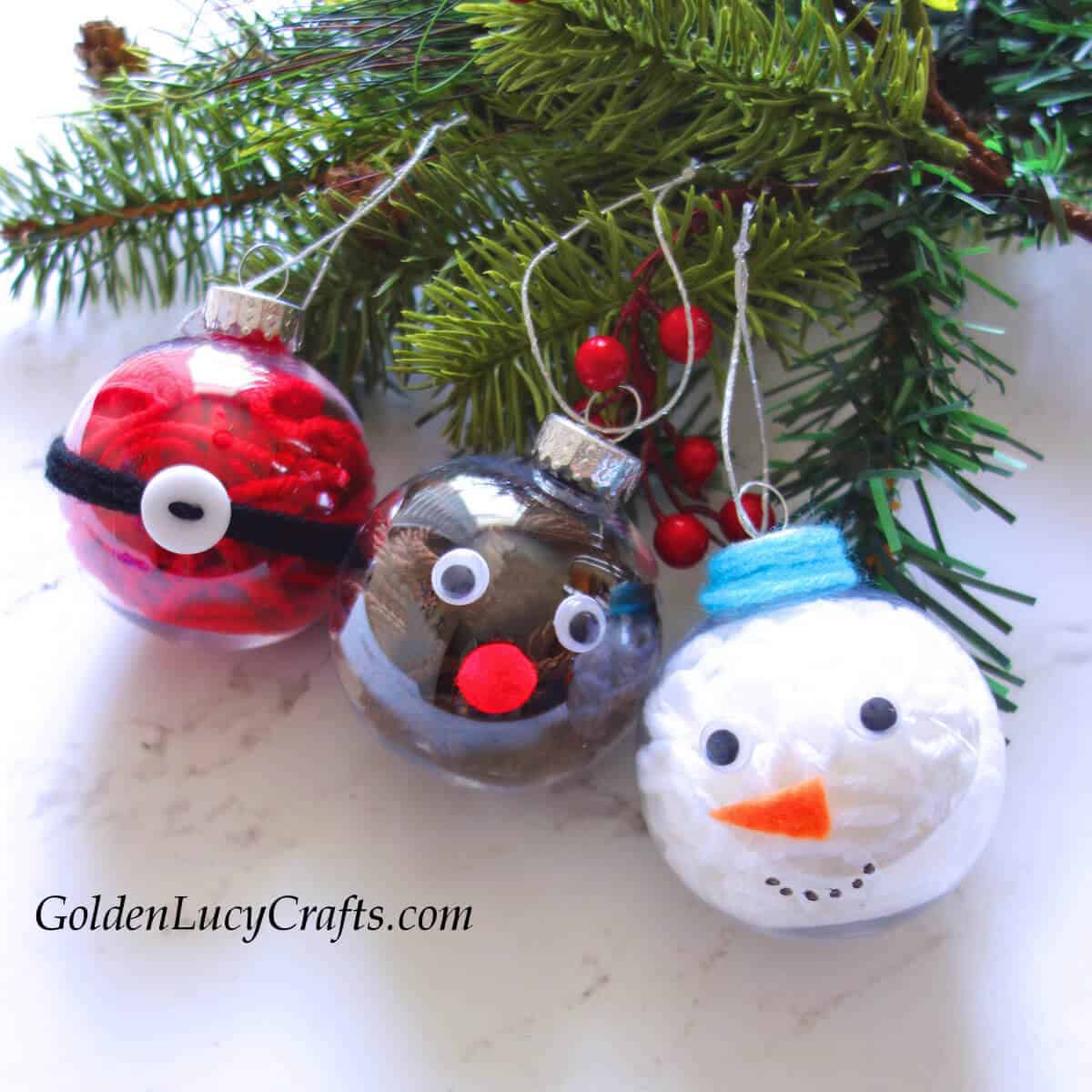 DIY Yarn-filled clear glass ornaments - Santa, reindeer, and snowman.