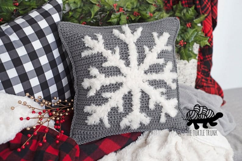 Crocheted snowflake pillow.
