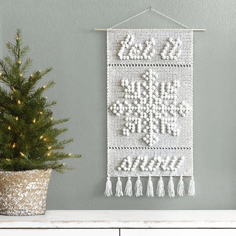 Crochet snowflake wall hanging.