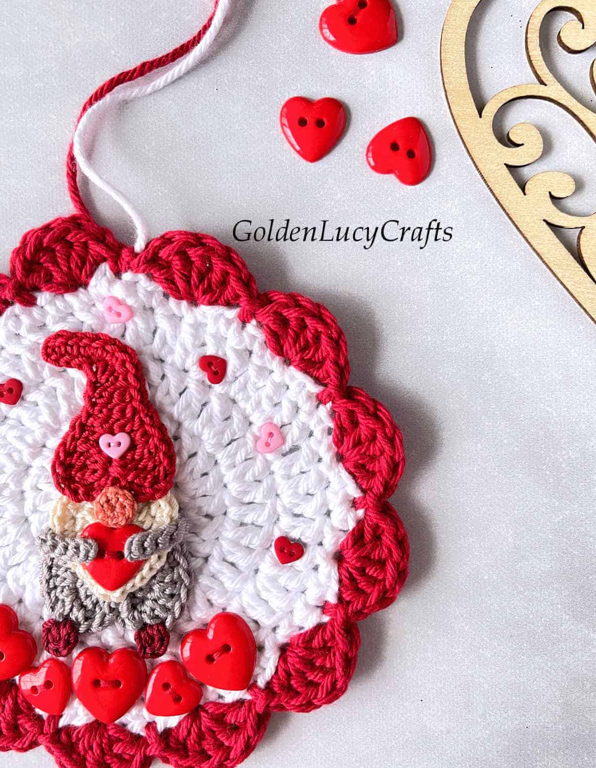 Close up picture of crocheted ornament for Valentine's Day.