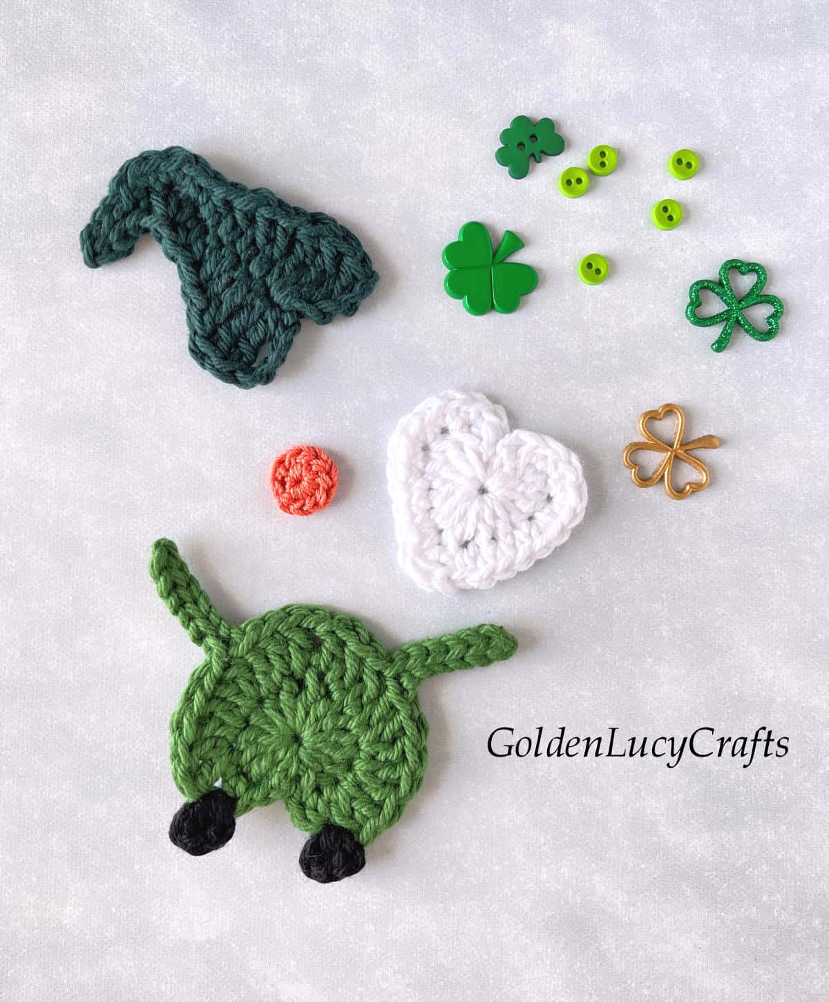 Parts of crocheted St Patrick's Day gnome applique.
