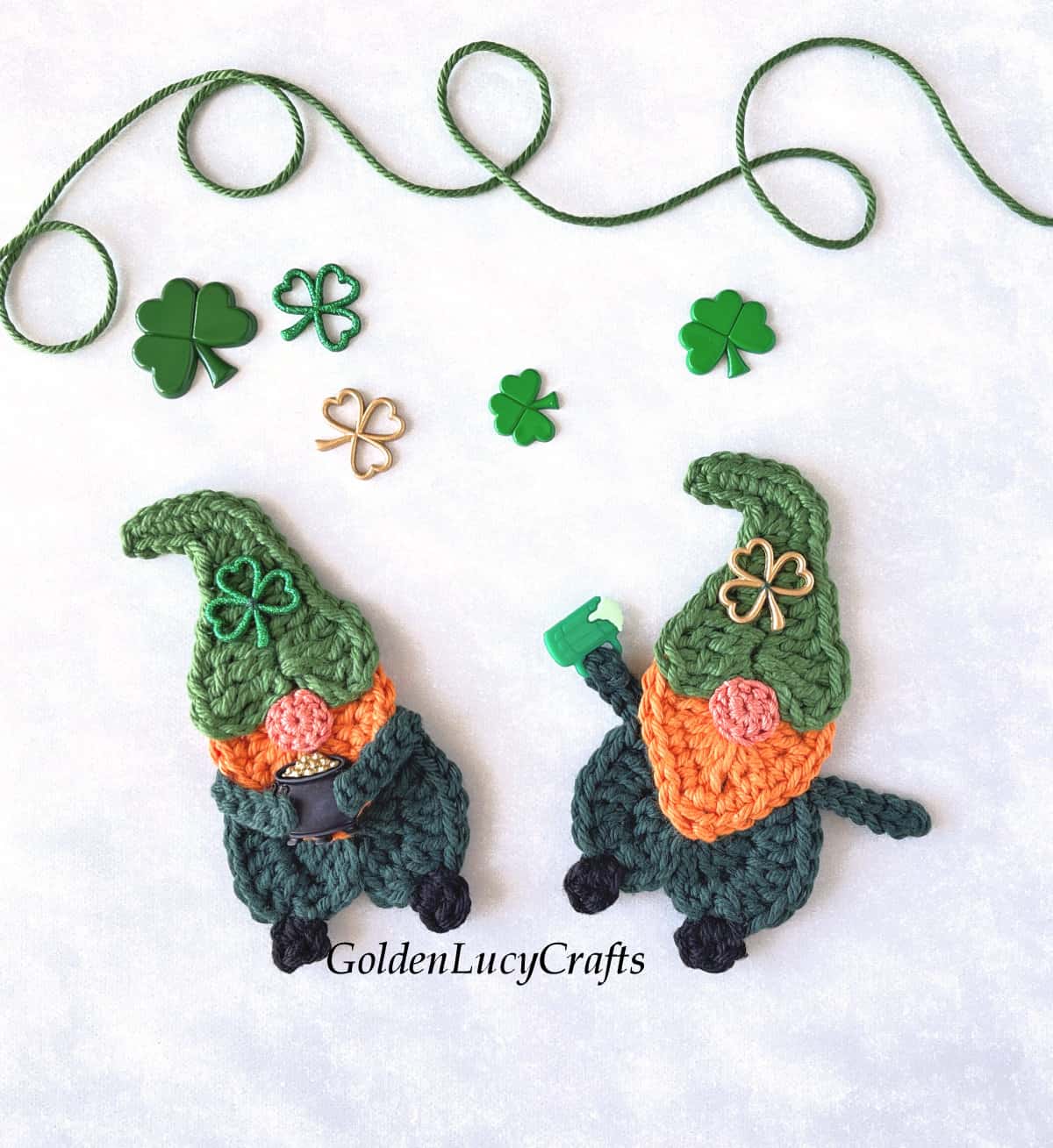 Two crochet leprechaun appliques.