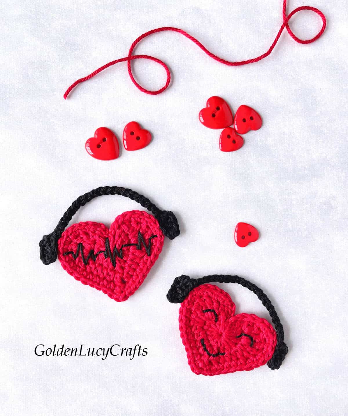 Crochet two red hearts with headphones.