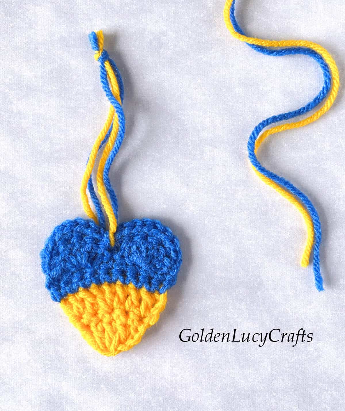 Crochet yellow-blue heart.