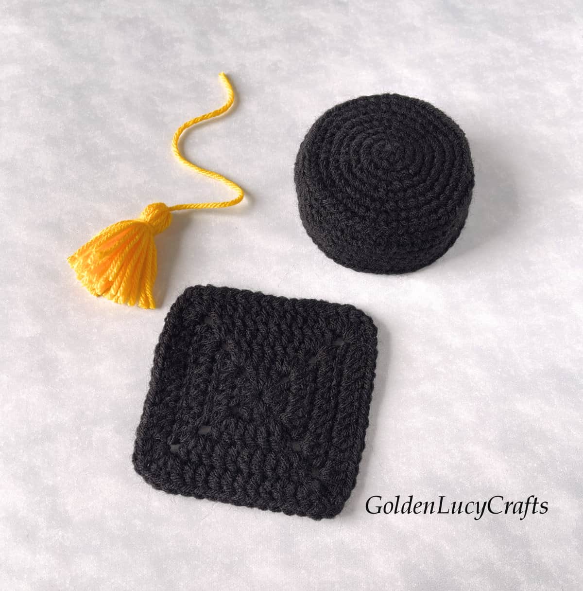 Patrs of crocheted graduation cap.