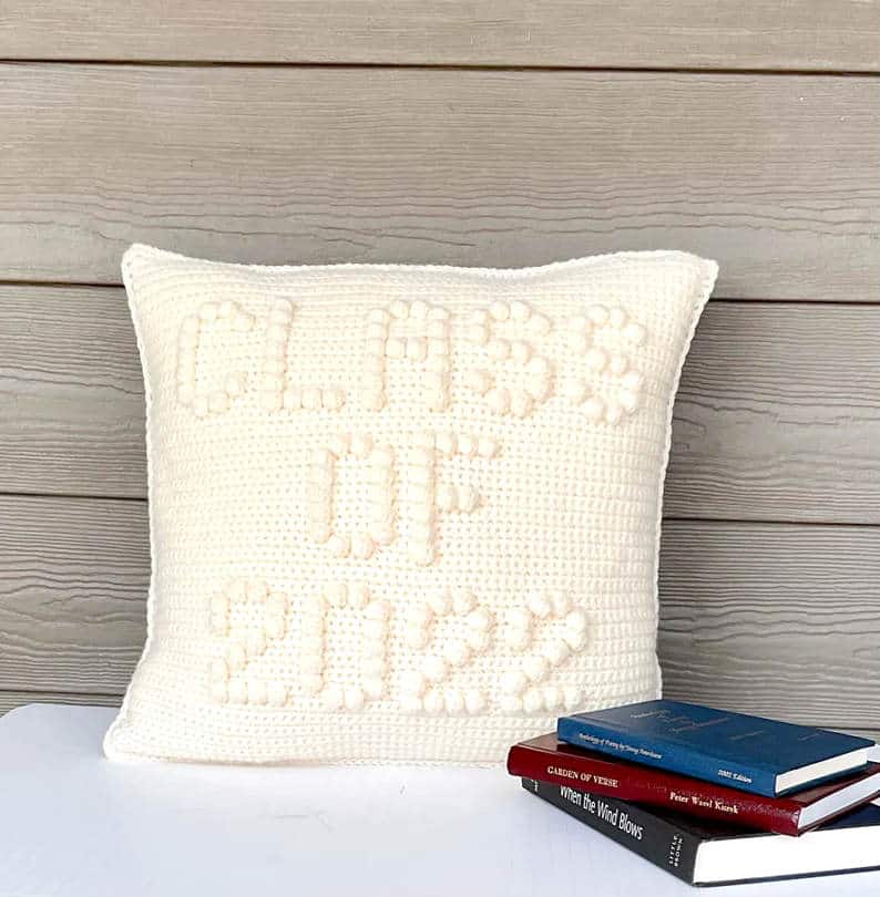 Crocheted white pillow class of 2022.