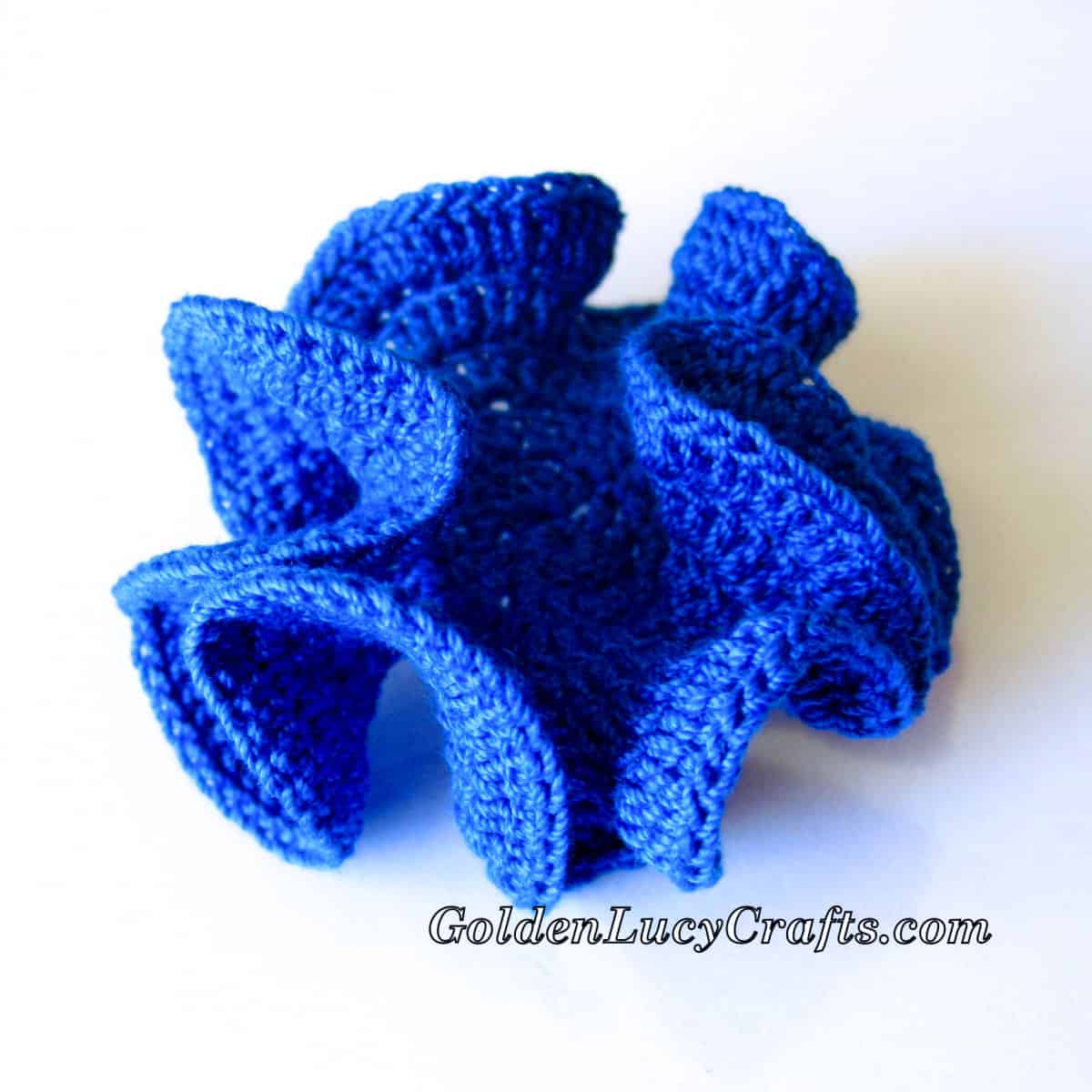 Crochet hyperbolic coral in royal blue color.