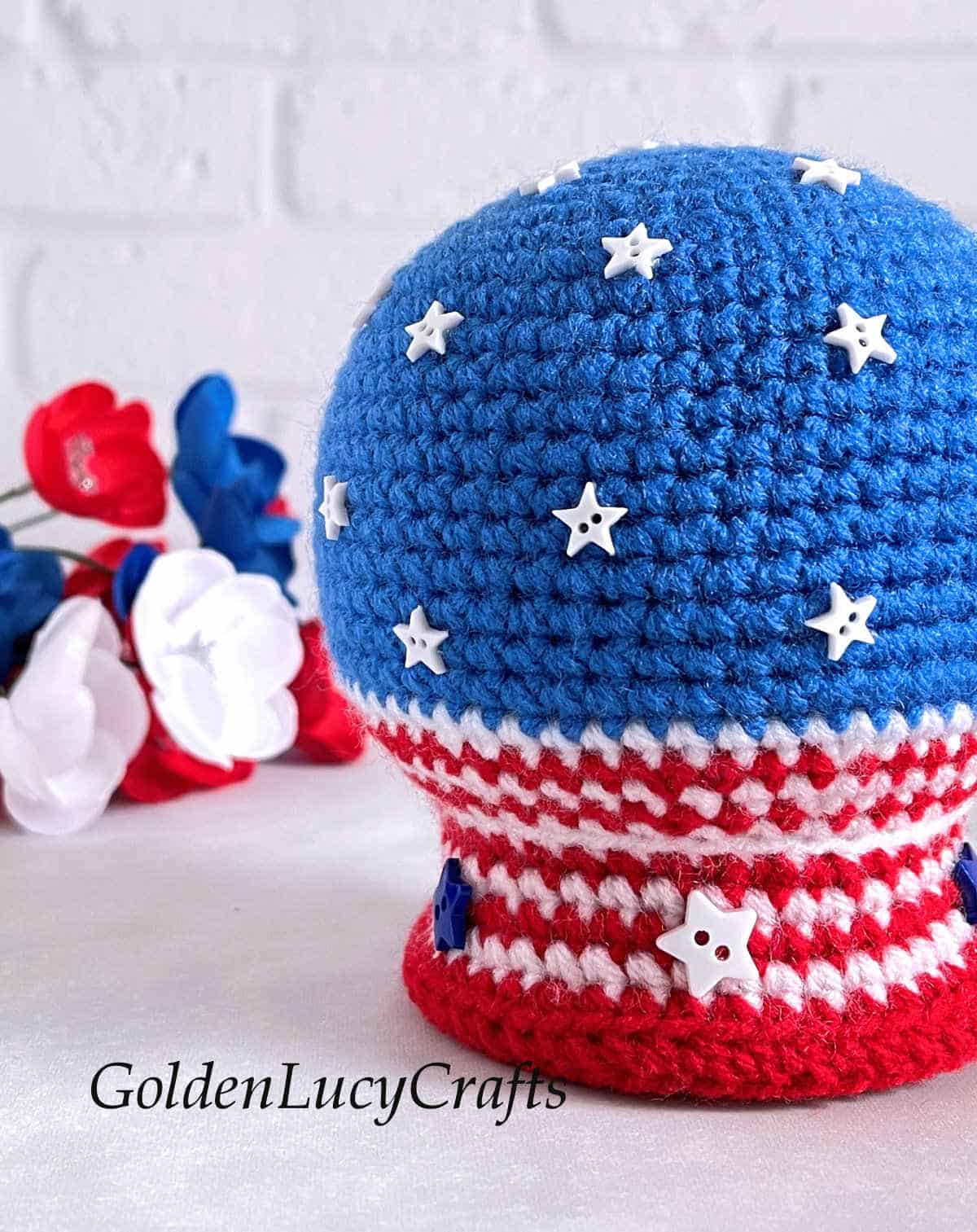 Crochet patriotic snow globe close up picture.