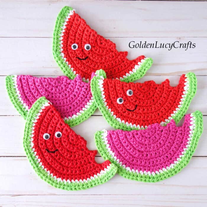Crochet watermelon slices in red and pink colors.