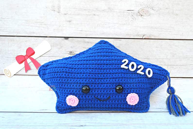 Blue crochet graduation cap amigurumi.