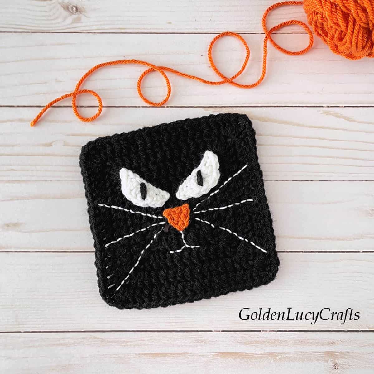 Crochet granny square black cat.
