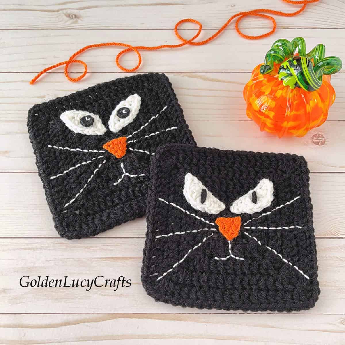 Two crochet black cat granny squares.