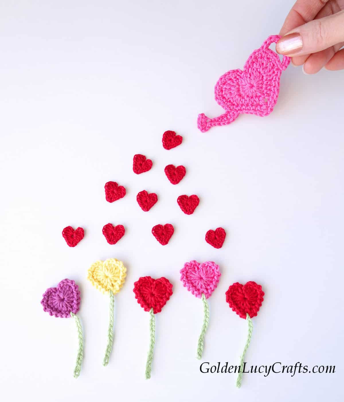 Crochet appliques heart flowers, watering can, small hearts.