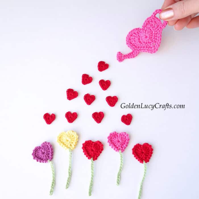 Crochet appliques heart flowers, heart-shaped watering can, small hearts.